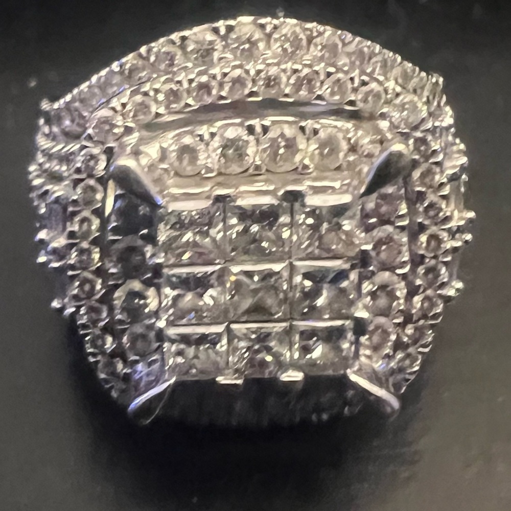 I am selling this Beautiful 2Carat Lab Grown Diamond Ring set in 10k White Gold.
